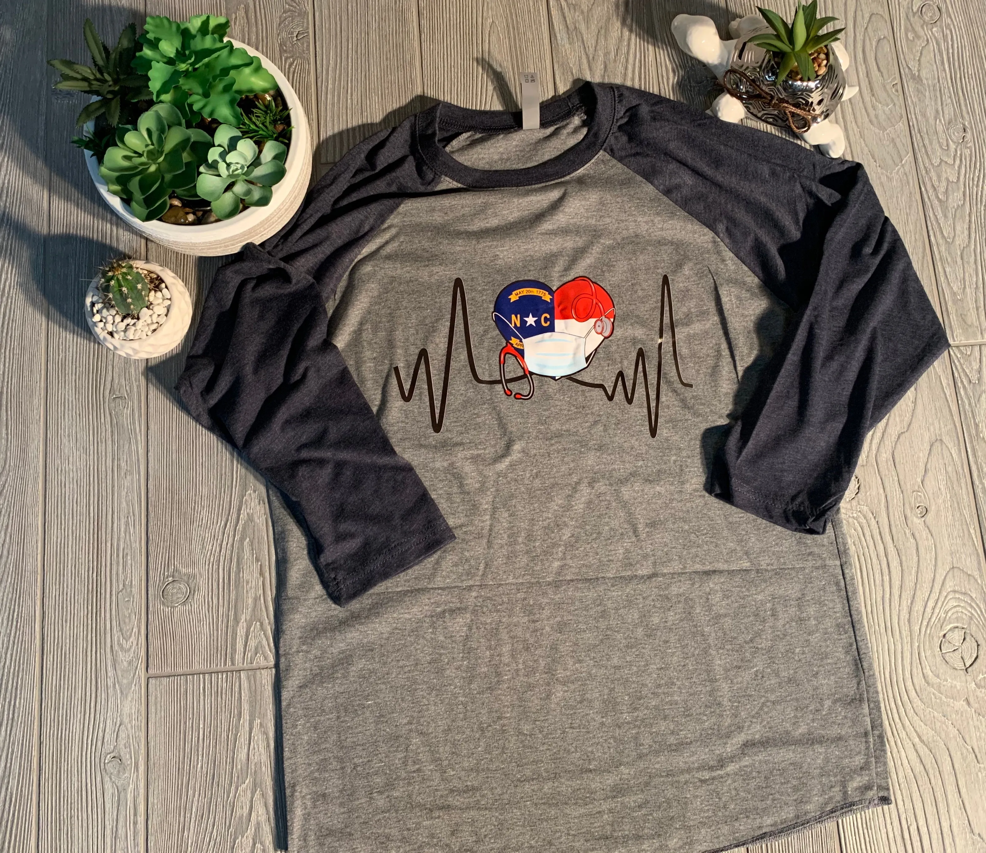 North Carolina - NC Flag Health Care Worker Heartbeat Shirt or Raglan